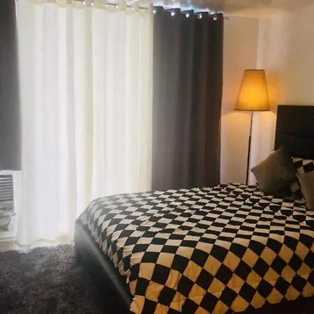 Riel\'S Condotel In Azure Beach Resort Residences